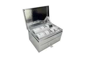 A luxury two-tier silver metallic rigid box designed for skincare sets, featuring a flip-top lid and a functional pull-out drawer. Expertly manufactured using ZY Pack's 10 fully automated production lines in Wenzhou, China, ensuring precision for premium beauty brands