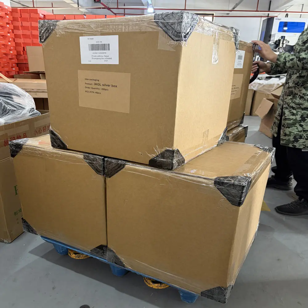 Bulk order of gift boxes stacked on a heavy-duty pallet, reinforced with plastic corner protectors and industrial-grade stretch wrap for international sea freight.