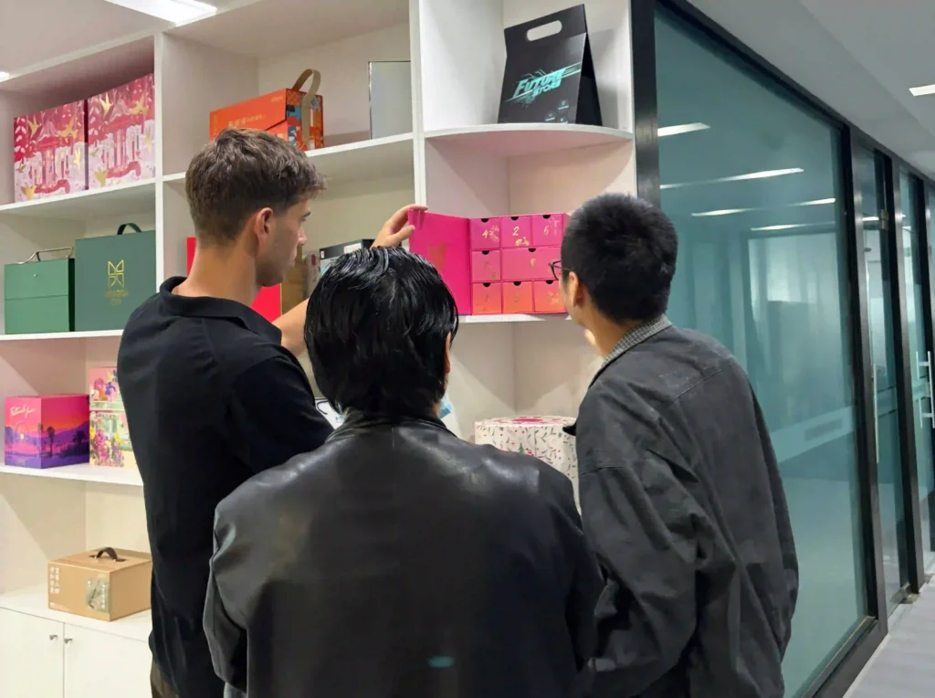 Professional consultation on custom advent calendar box design Steven Cai discussing double door advent calendar box with Jordan from Inke Packaging