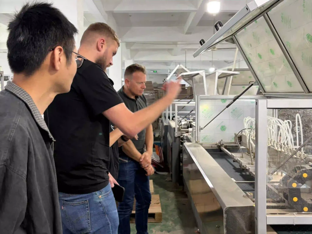 Advanced automated gluing technology for luxury rigid boxes