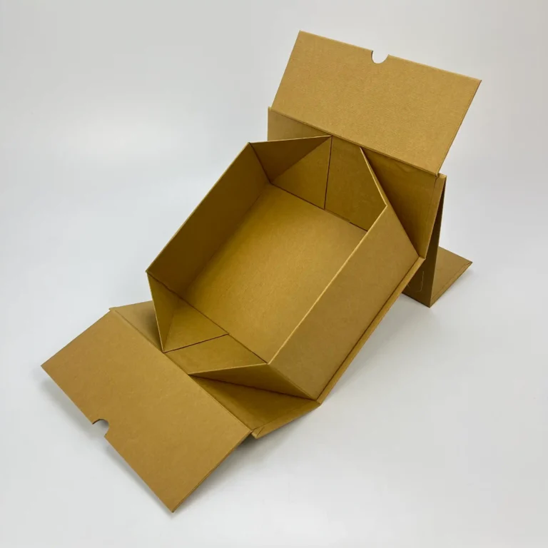 Collapsible rigid box opened flat showing magnetic folding structure in gold kraft finish