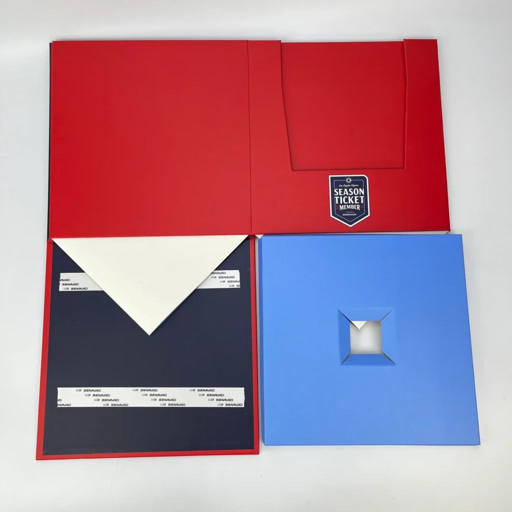 Side-folding collapsible rigid box panels laid flat showing four-panel structure with snap-lock base insert for cubic sports gift packaging